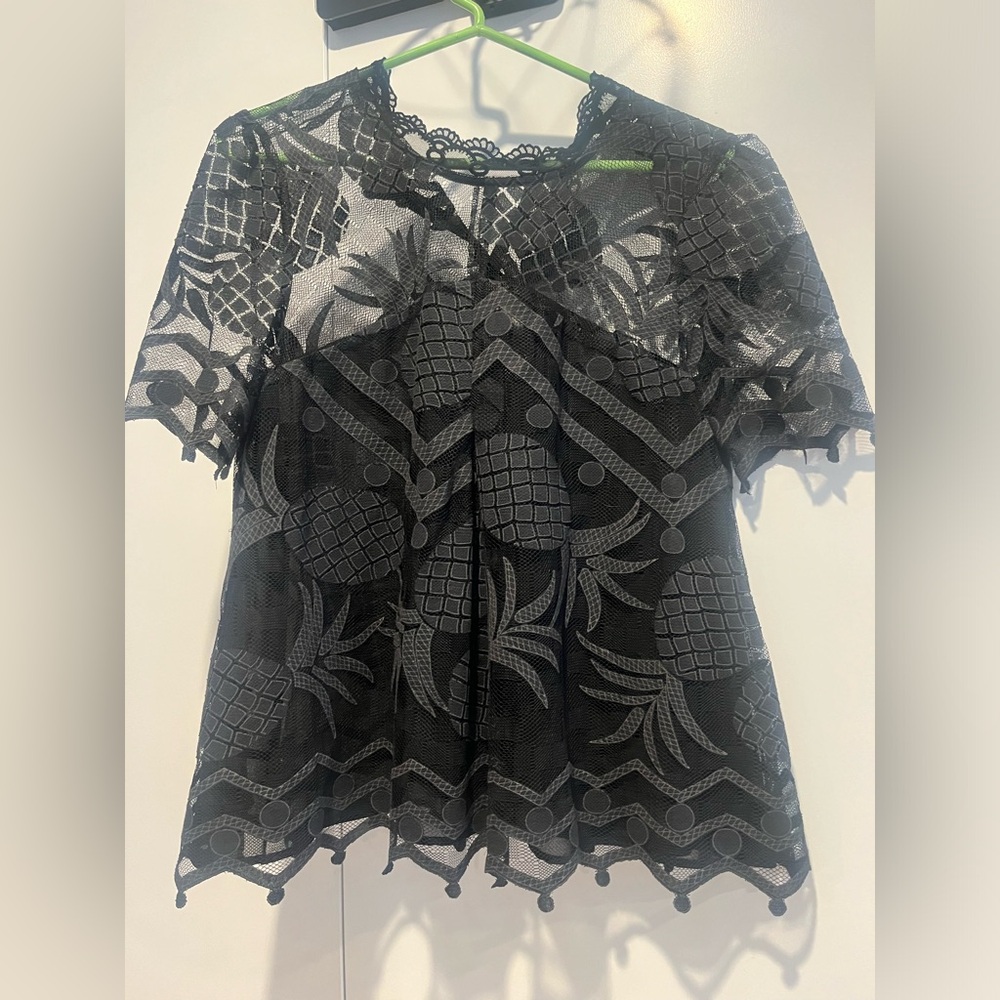 Short sleeve Anthropologie lace shirt with button neck